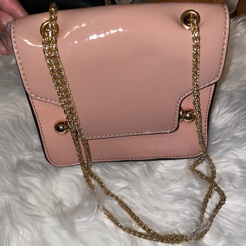 Stylish nude pinkish cross Cody bag